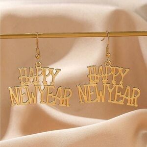 NWOT “Happy New Year” Drop Gold Metal Earrings